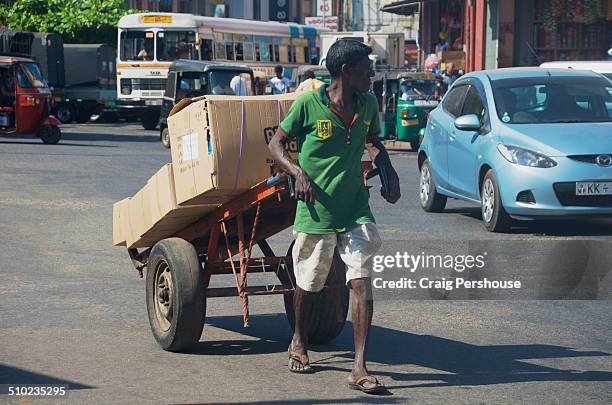 Strong Man Pulling Car Photos and Premium High Res Pictures - Getty Images