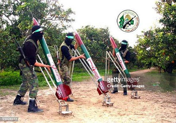 Recent undated handout photo made available July 4, 2004 by the militant Palestinian Hamas group shows armed Hamas activists standing with their...
