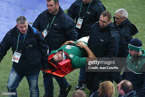 Mike McCarthy of Ireland, injured, leaves the field during the RBS 6 Nations match between France and Ireland at Stade de France on February 13, 2016...