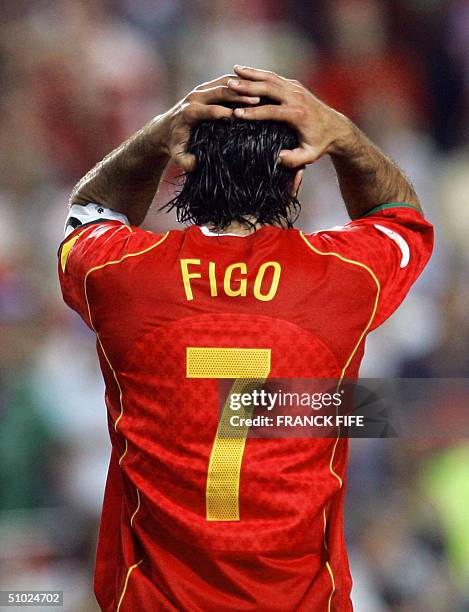 Portugal's captain Luis Figo rues a missed opportunity, 04 July 2004 at the Luz stadium in Lisbon, during the Euro 2004 final match between Portugal...