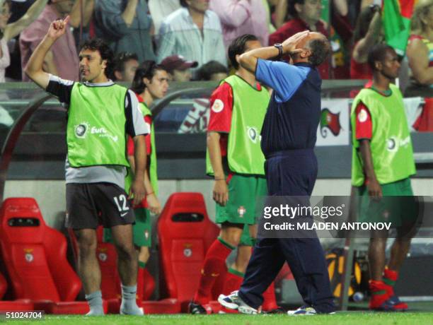 Portugal's coach Luiz Felipe Scolari holds his head in his hands, 04 july 2004 at the Stadio Da Luz in Lisbon, during the Euro 2004 final match...