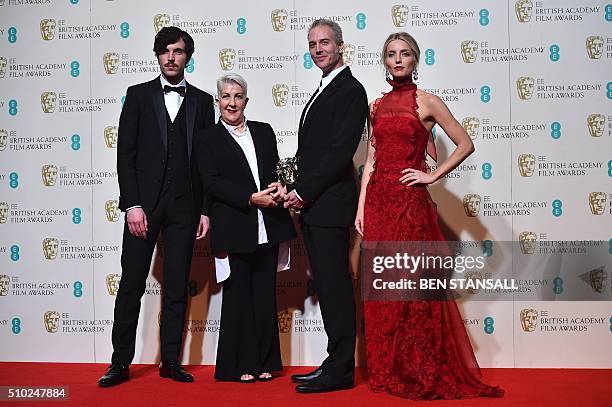 Australian hair designer and make-up artists Lesley Vanderwalt and Damian Martin pose between presenters presenter British actress Annabelle Wallis...