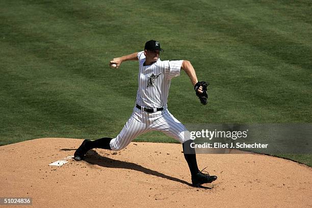 Pitcher A.J. Burnett of the Florida Marlins pitches against the Tampa Bay Devil Rays July 4, 2004 at Pro Player Stadium in Miami, Florida.