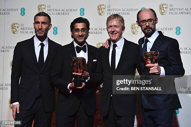 British director Asif Kapadia, British producer James Gay-Rees, David Joseph and Chris King pose with the awards for a documentary for 'Amy' at the...