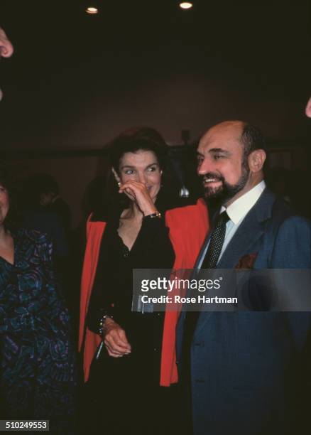Jacqueline Kennedy Onassis and Art Director and a Photographer, Alexander Gotfryd at a book launch being held at the Tiffany & Co. Store, 1986.
