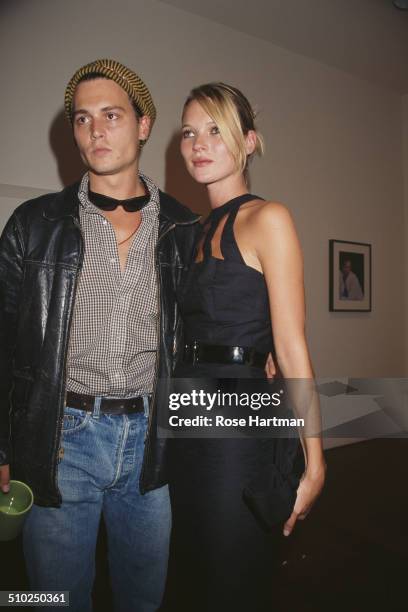 American actor and film producer, Johnny Depp, and English model, Kate Moss, at the Danziger Gallery, New York City, USA, 11th September 1995.
