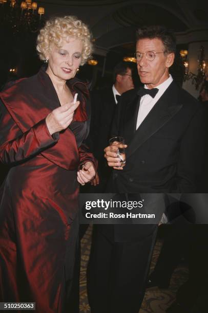 English fashion designer and businesswoman, Vivienne Westwood, and American fashion designer, Calvin Klein, attend the '13th Annual Night of Stars'...