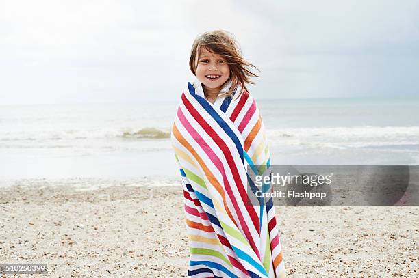 child having fun at the beach - kid girl towel stock pictures, royalty-free photos & images