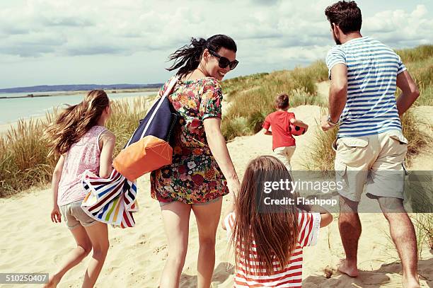 family day out at the beach - beach bag stock pictures, royalty-free photos & images