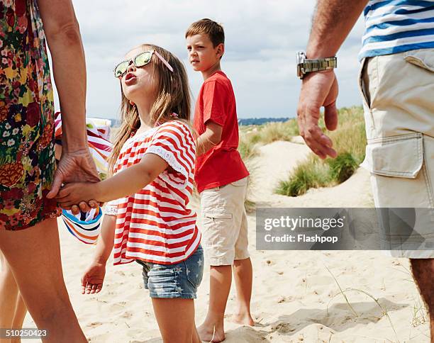 family day out at the beach - mother father stock pictures, royalty-free photos & images