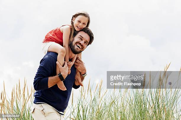 portrait of father and daughter - long hair stock pictures, royalty-free photos & images