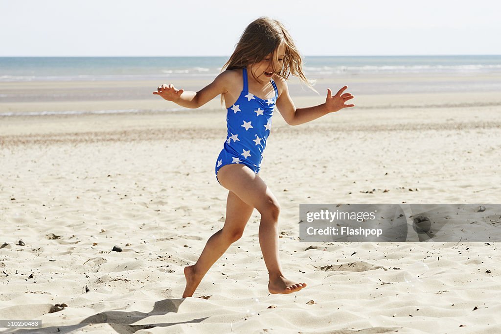 Child having fun at the beach