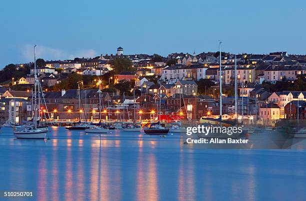 cityscape of falmouth illuminated at dusk - falmouth england stock pictures, royalty-free photos & images