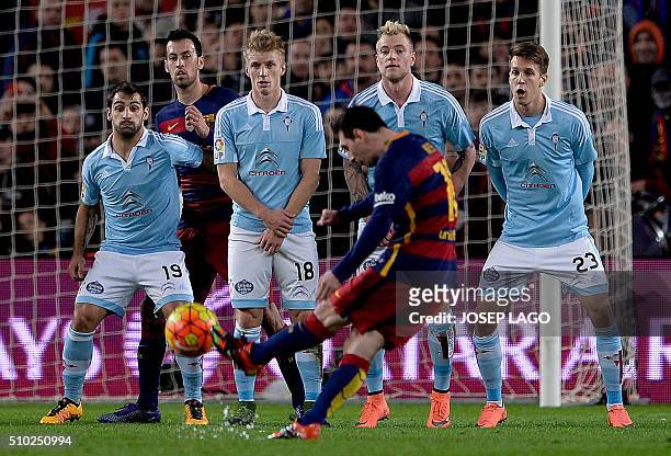 Barcelona's Argentinian forward Lionel Messi shoots a free kick to score a goal during the Spanish league football match FC Barcelona vs RC Celta de...