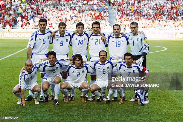 The Greek team pose for the press, 04 July 2004 at the Luz stadium in Lisbon, prior to the Euro 2004 final match between Portugal and Greece at the...