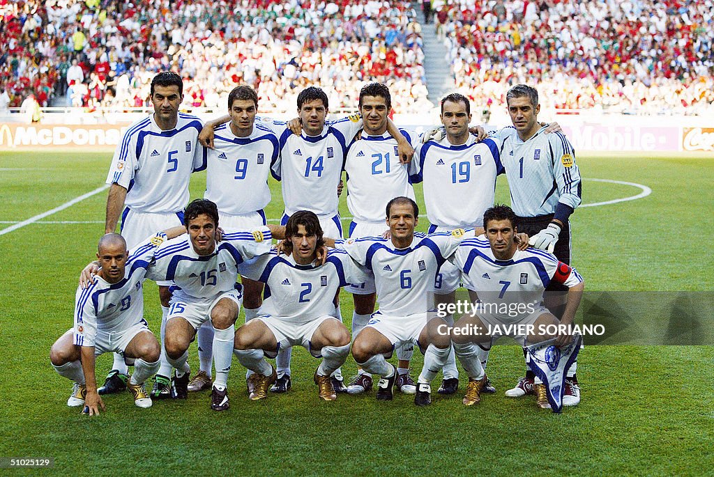 The Greek team pose for the press, 04 Ju
