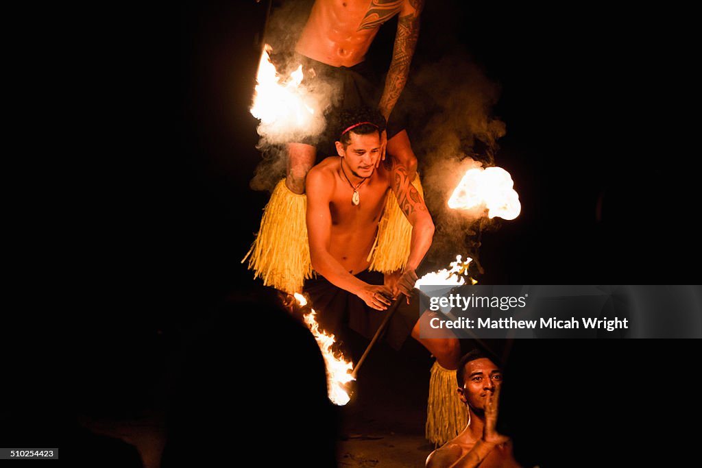 Local fire dancers perform for guests