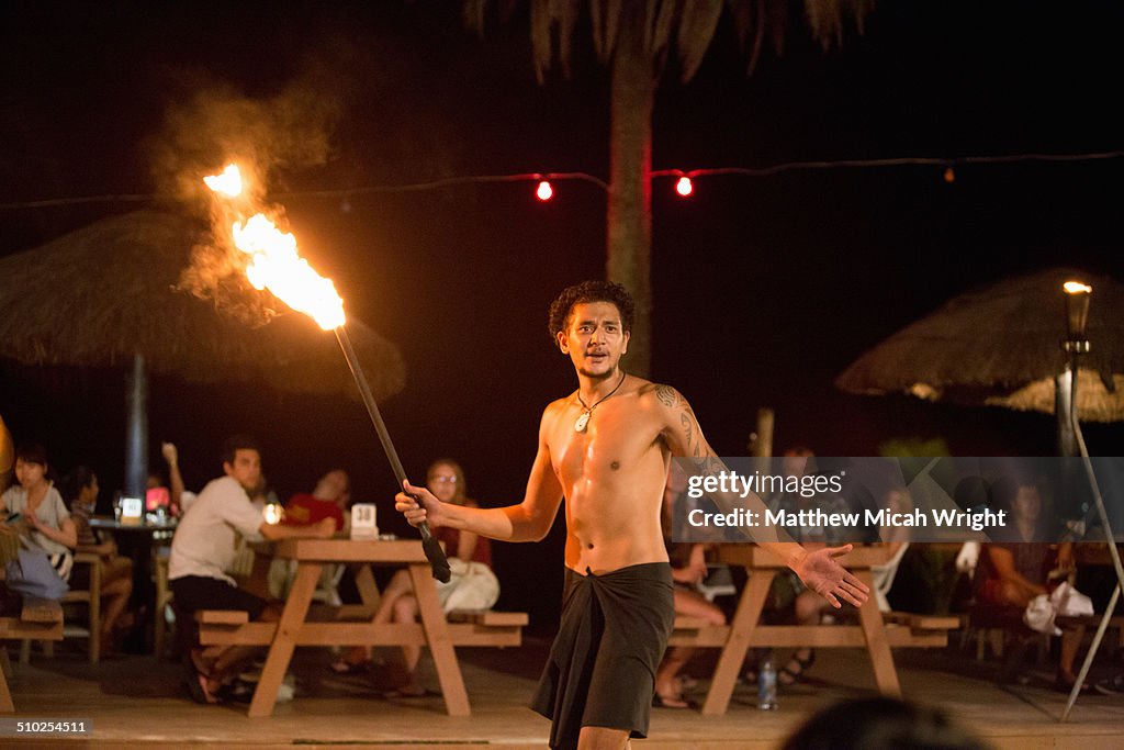 Local fire dancers perform for guests