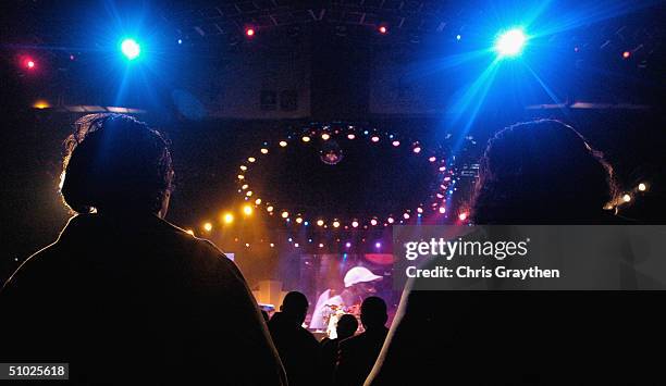 The audience watches Maze featuring Frankie Beverly as they perform at the 10th Anniversary Essence Music Festival at the Superdome on July 4, 2004...