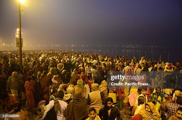 Hindu devotees offer prepare to take holydip at Sangam, the confluence of River Ganga Yamuna and Mythological Saraswati on the ocassion of Basant...