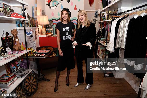 Alexa Chung and Tennessee Thomas pose together during The Deep End Club Collection launch hosted by Alexa Chung at The Deep End Club on February 14,...