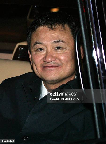 Dr Thaksin Shinawatra Prime Minister of Thailand leaves in a limosine after being greeted at Wellington Airport by Dr Michael Cullen, New Zealand...