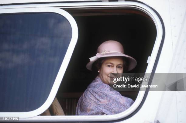 Queen Elizabeth II sitting on a coach to tour the Sicarsta Steel Works on February 18, 1983 in Acapulco, Mexico. Queen Elizabeth II was on a Royal...