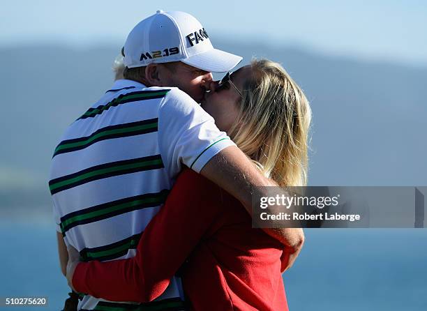 Vaughn Taylor celebrates with wife Leot and son Locklyn after winning the AT&T Pebble Beach National Pro-Am at the Pebble Beach Golf Links on...