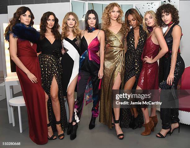 Lily Aldridge, Irina Shayk, Gigi Hadid, Kendall Jenner, Karlie Kloss, Jourdan Dunn, Elsa Hosk and Alanna Arrington pose in the Diane Von Furstenberg...