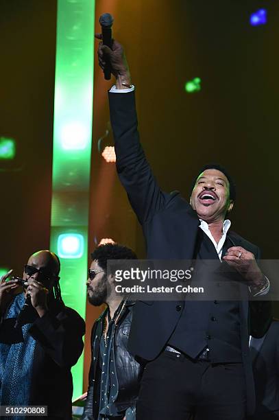 Stevie Wonder, Lenny Kravitz, Lionel Richie perform onstage during the 2016 MusiCares Person of the Year honoring Lionel Richie at the Los Angeles...