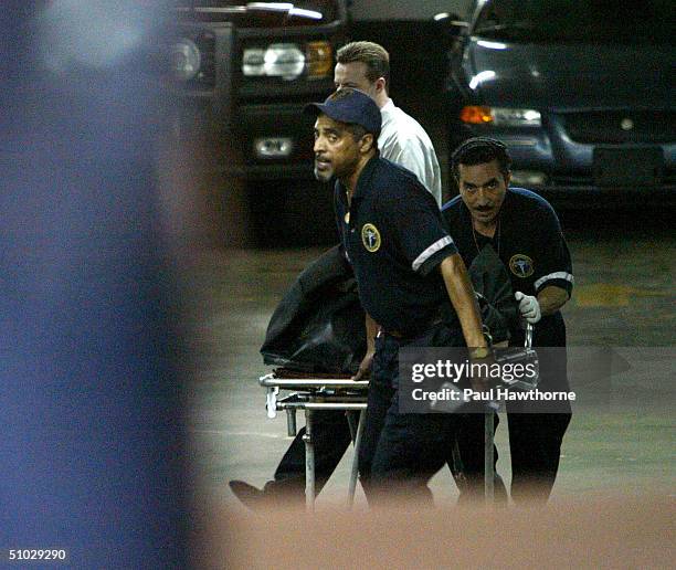 Eric Douglas, youngest son of actor Kirk Douglas, is taken out of an apartment building at 10 East 29th street after being found dead July 6, 2004 in...