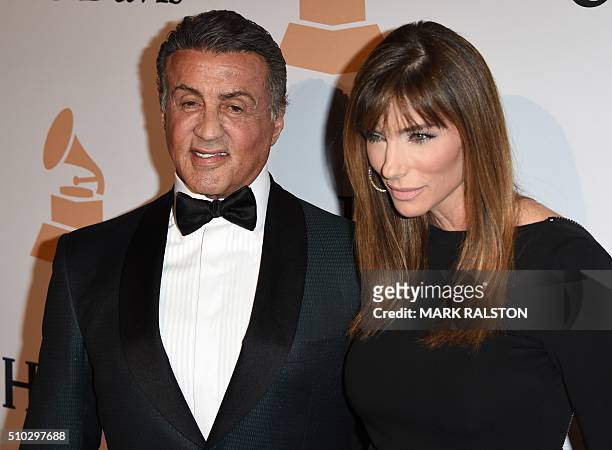 Actor Sylvester Stallone and his wife Jennifer Flavin arrive for the Clive Davis & The Recording Academy's 2016 Pre-Grammy Gala in Beverly Hills,...