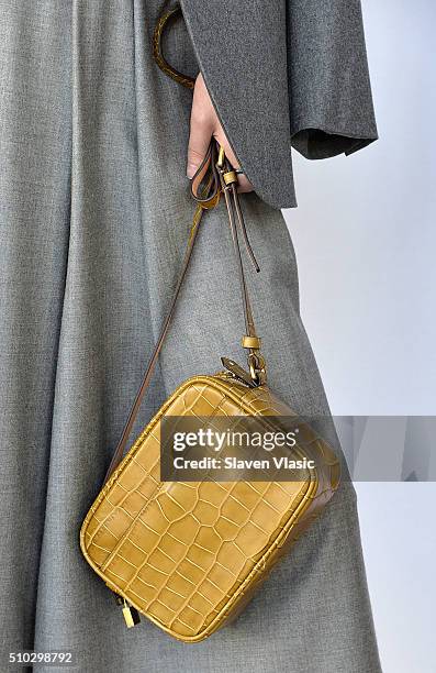 Model poses at J.Crew presentation during Fall 2016 New York Fashion Week at Spring Studios on February 14, 2016 in New York City.