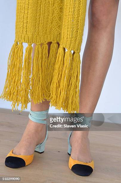 Model poses at J.Crew presentation during Fall 2016 New York Fashion Week at Spring Studios on February 14, 2016 in New York City.