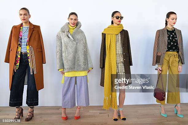 Models pose at J.Crew presentation during Fall 2016 New York Fashion Week at Spring Studios on February 14, 2016 in New York City.