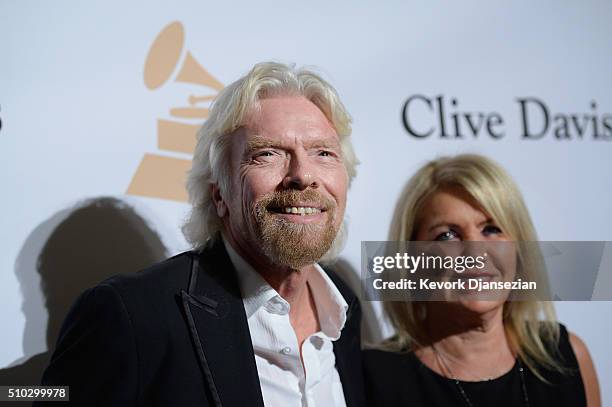 Businessman Richard Branson and Joan Templeman attend the 2016 Pre-GRAMMY Gala and Salute to Industry Icons honoring Irving Azoff at The Beverly...