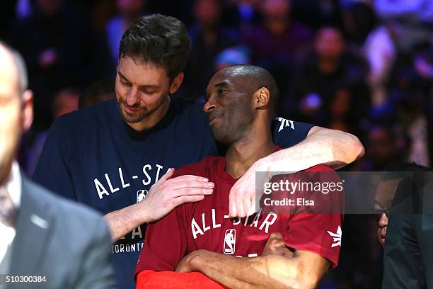 Pau Gasol of the Chicago Bulls and the Eastern Conference and Kobe Bryant of the Los Angeles Lakers and the Western Conference look on late in the...