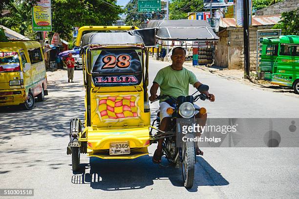 tricycle in cebu, philippines - filipino tricycle stock pictures, royalty-free photos & images