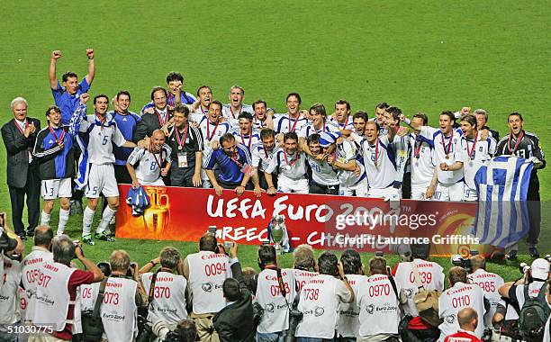 The Greek Team celebrate victory following the UEFA Euro 2004, Final match between Portugal and Greece at the Luz Stadium on July 4, 2004 in Lisbon,...