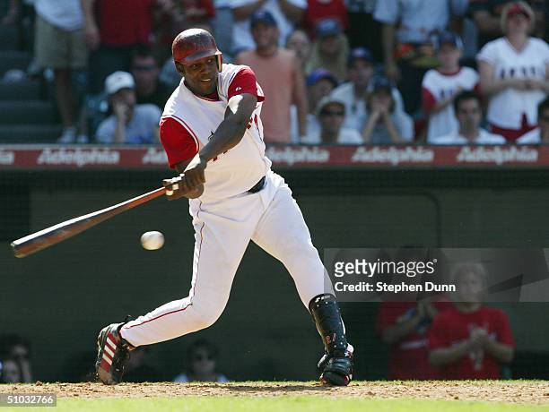 Vladimir Guerrero of the Anaheim Angels runs to first during the game against the Chicago Cubs on June 13, 2004 at Angel Stadium in Anaheim,...