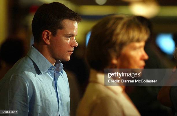 Actor Matt Damon and his mother Nancy Carlsson Paige speak to the press at the premiere of his new movie "The Bourne Supremacy" July 7, 2004 at the...