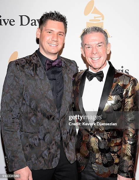 Alex Carr and radio personality Elvis Duran attend the 2016 Pre-GRAMMY Gala and Salute to Industry Icons honoring Irving Azoff at The Beverly Hilton...