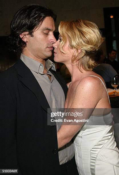 Actors Christina Applegate and husband Johnathon Schaech arrive at a special screening of the film "Anchorman: The Legend of Ron Burgundy" on July 7,...