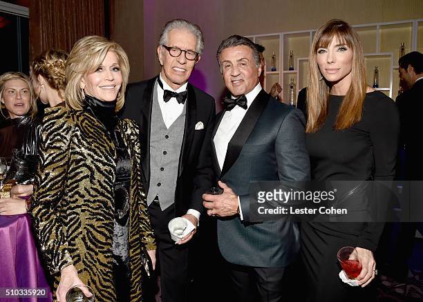 Actress Jane Fonda, record producer Richard Perry, actor Sylvester Stallone, and model Jennifer Flavin attend the 2016 Pre-GRAMMY Gala and Salute to...