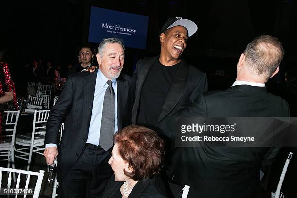 Producer Harvey Weinstein, rapper Jay Z and actor Robert De Niro attend the amFAR New York Gala at Cipriani Wall Street in New York, NY on February...