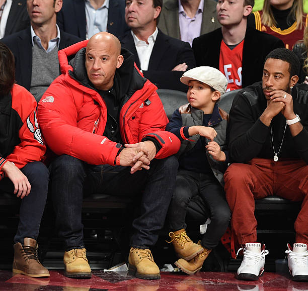 Actor Vin Diesel, son Vincent Sinclair and Ludacris attend the 2016 NBA All-Star Game at Air Canada Centre on February 14, 2016 in Toronto, Canada.