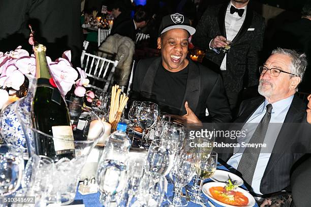 Rapper Jay Z and actor Robert De Niro talk during the amFAR New York Gala at Cipriani Wall Street in New York, NY on February 10, 2016.