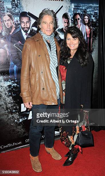 Actor Ronn Moss and wife/model Devin Devasquez arrive for the Screening Of Oscar Gold Productions' "Vigilante Diaries" held at ArcLight Hollywood on...