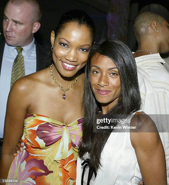 Actors Garcelle Beauvais and Jada Pinkett Smith pose at the after-party for the premiere of Twentieth Century Fox's "I, Robot" at the Armand Hammer...