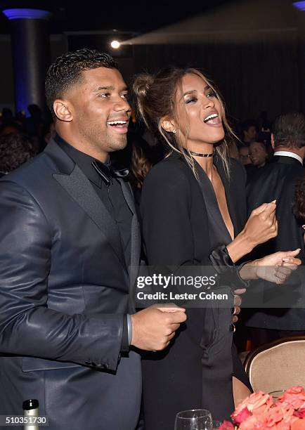 Player Russell Wilson and Ciara attend the 2016 Pre-GRAMMY Gala and Salute to Industry Icons honoring Irving Azoff at The Beverly Hilton Hotel on...